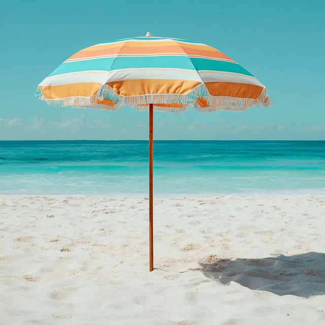 Sonnenschirm am Sandstrand